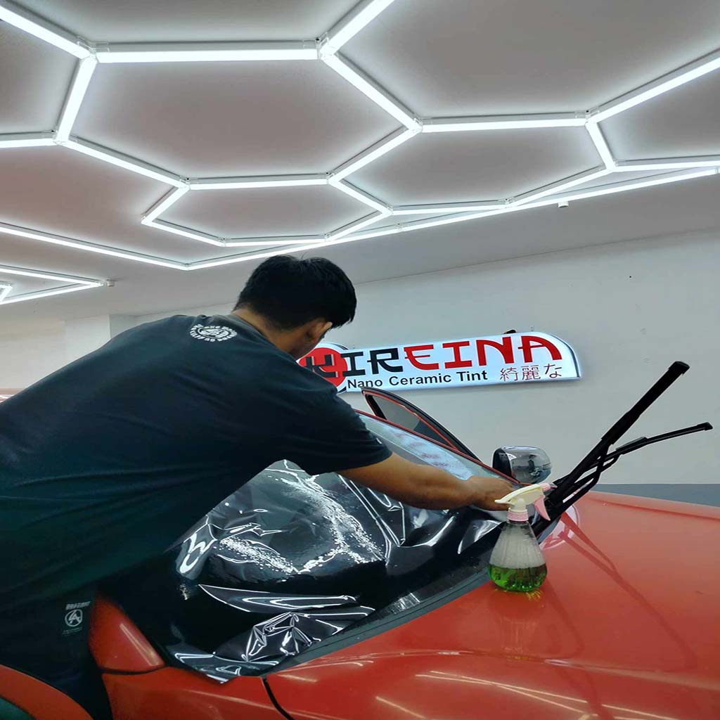 installing kireina nano ceramic tint on a red car